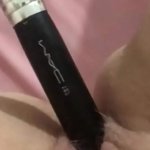 Closeup masturbating with brush in pussy