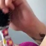 punching a brush in the pussy