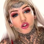 Amber Luke aka Blue Eyes White Dragon gets a new 666 face tattoo!