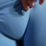 Puffy pussy girl in blue leggings and a big tits showing off.