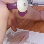 Squirting piss while getting ass fucked by big dildo on the fucking machine